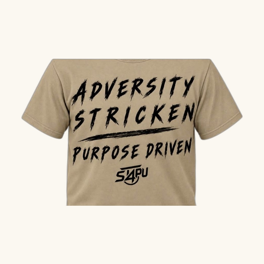 Tan Stricken 4 Purpose tee with the black ADVERSITY STRICKEN, PURPOSE DRIVEN design and the S4PU mark